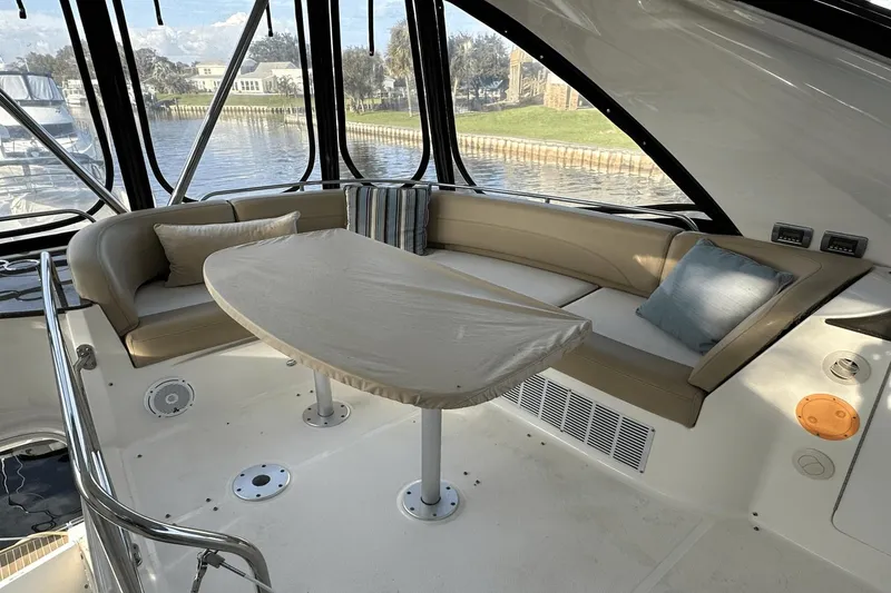 Slide: The Image of Luxurious interior of 2015 Meridian 441 Sedan yacht with elegant seating and table. - 27