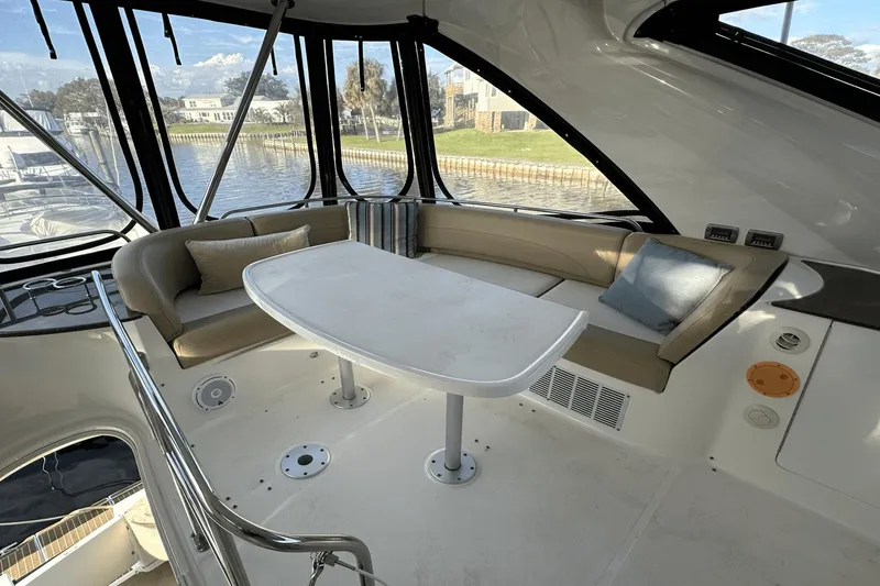 Slide: The Image of Luxurious interior of 2015 Meridian 441 Sedan yacht with elegant seating and table. - 28