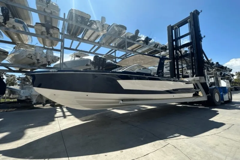 Slide: The Image of 2022 Aviara AV32 Outboard boat on forklift, marina storage. - 41
