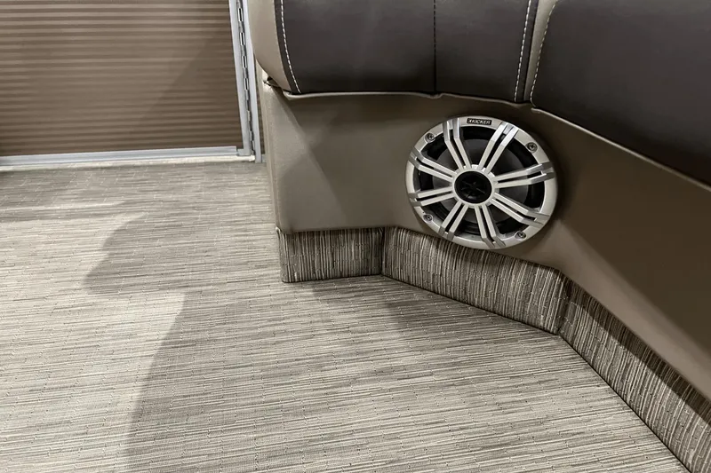 Slide: The Image of Bennington 23RSBDN2019 boat interior with speaker and textured flooring. - 17