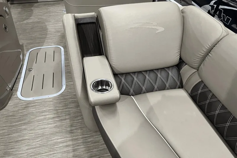 Slide: The Image of Luxurious seating on 2019 Bennington 23RSBDN boat with cup holder and stylish upholstery. - 18