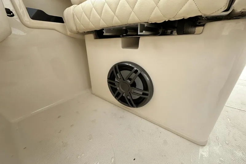Slide: The Image of 2022 Grady-White 275 Freedom boat interior with speaker and cushioned seat. - 20