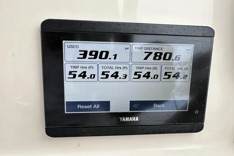 Slide: The Image of Yamaha display showing fuel usage and trip data for 2022 Grady-White 275 Freedom. - 24