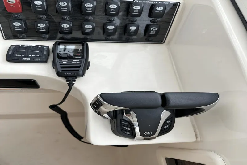 Slide: The Image of Control panel of 2022 Grady-White 275 Freedom boat with Garmin device. - 25