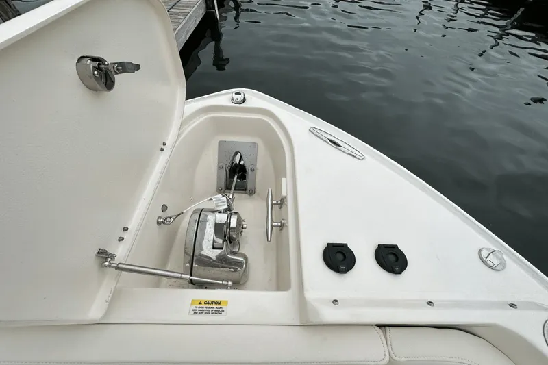 Slide: The Image of Anchor compartment of 2022 Grady-White 275 Freedom boat at dock. - 34