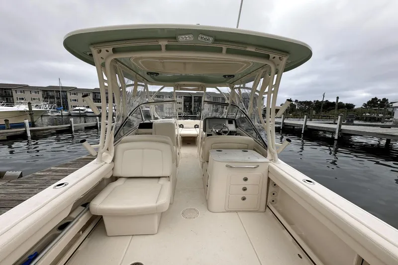 Slide: The Image of 2022 Grady-White 275 Freedom boat interior at marina dock. - 8