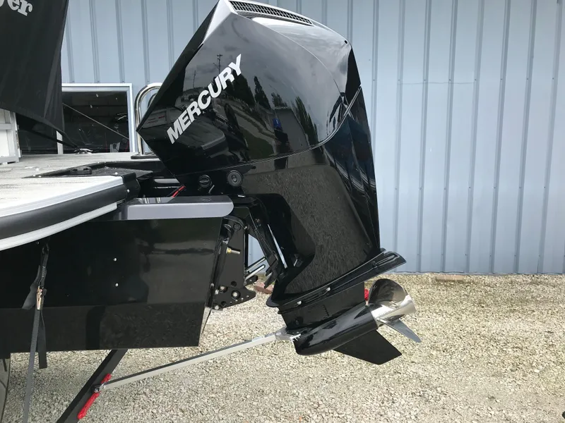 Slide: The Image of 2024 Ranger Reata 223C boat with Mercury outboard motor. - 7