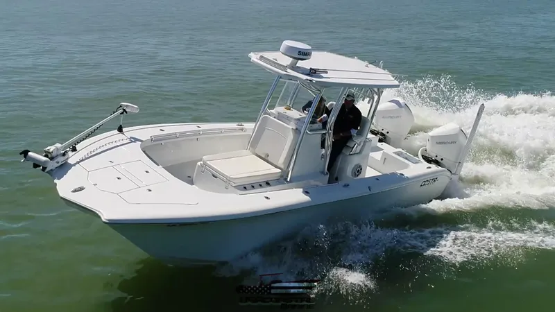 Slide: The Image of 2020 Costa Custom Boats 264 HC cruising on open water, showcasing sleek design and performance. - 19