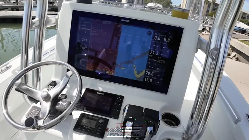 Slide: The Image of 2020 Costa Custom Boats 264 HC dashboard with advanced navigation and control systems. - 2