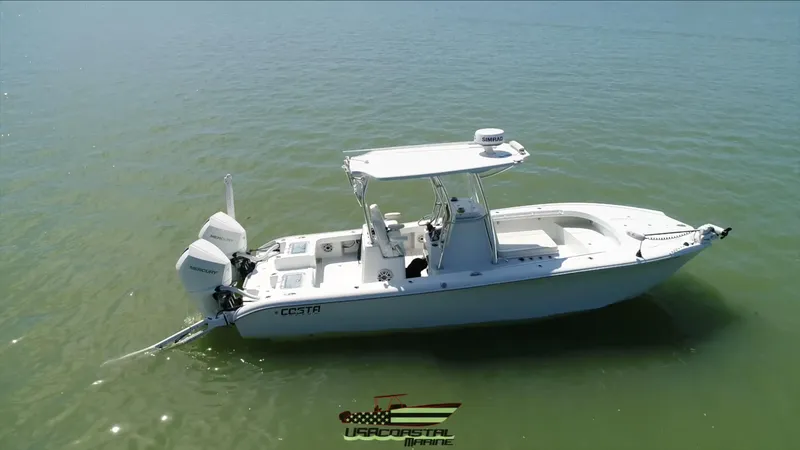 Slide: The Image of 2020 Costa Custom Boats 264 HC on calm water, showcasing sleek design and modern features. - 22