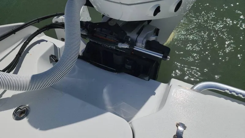 Slide: The Image of 2020 Costa Custom Boats 264 HC, detailed view of boat's engine and deck area. - 30