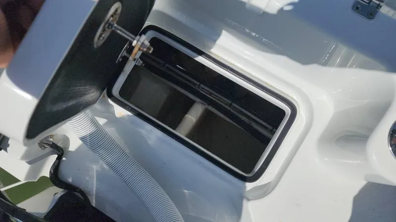 Slide: The Image of Open storage compartment on a 2020 Costa Custom Boats 264 HC. - 31