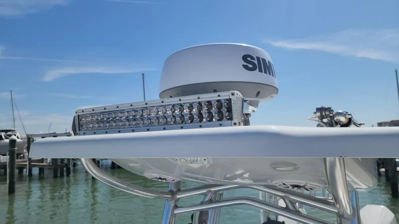 Slide: The Image of 2020 Costa Custom Boats 264 HC with radar and LED light bar on a sunny day. - 38