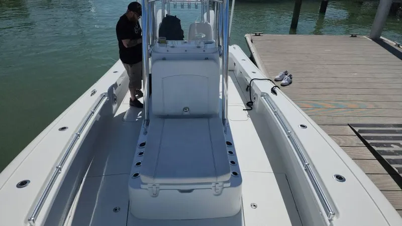 Slide: The Image of 2020 Costa Custom Boats 264 HC docked, featuring spacious deck and sleek design. - 43