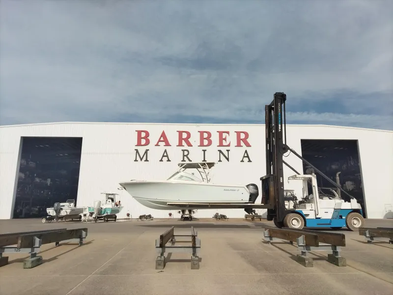 The Image of Sailfish 275 DC boat lifted at Barber Marina, 2020 model. - 0