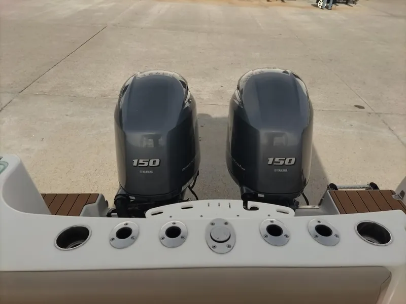 Slide: The Image of 2020 Sailfish 275 DC boat with twin Yamaha 150 outboard engines. - 6