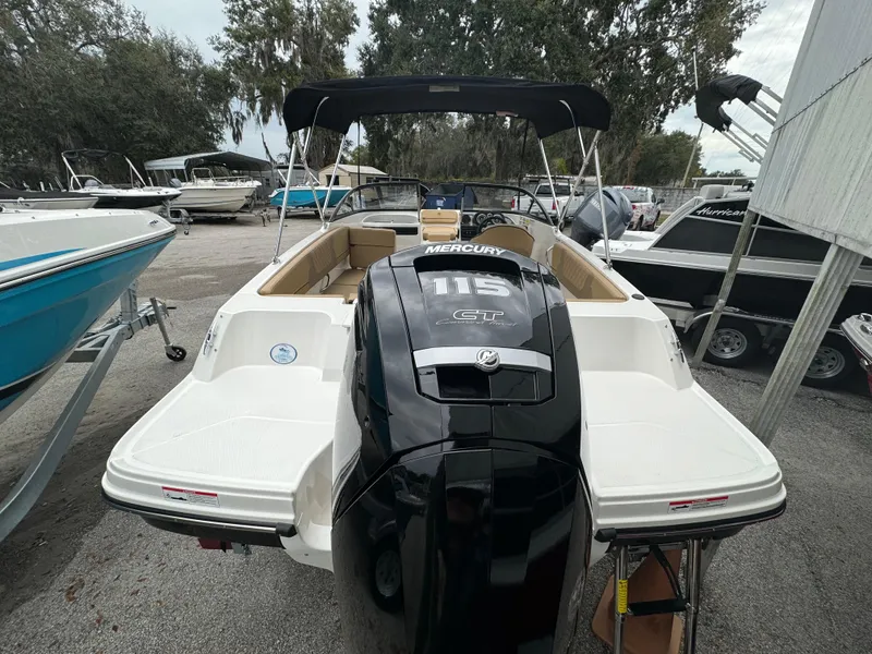 Slide: The Image of 2026 Bayliner VR4 Bowrider OB with Mercury engine, rear view. - 5