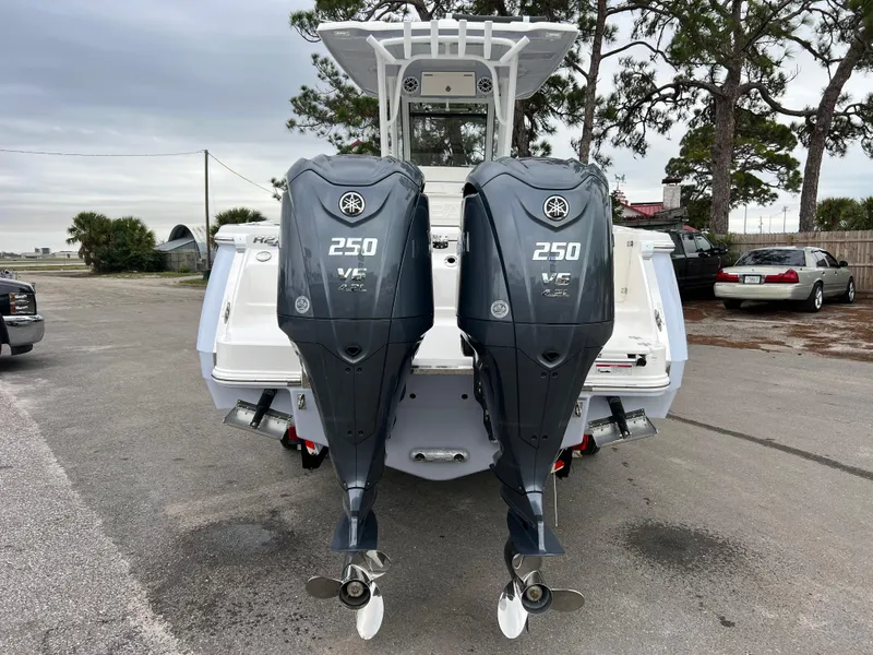 Slide: The Image of 2024 Robalo R270 boat with dual Yamaha 250 V6 outboard engines. - 3
