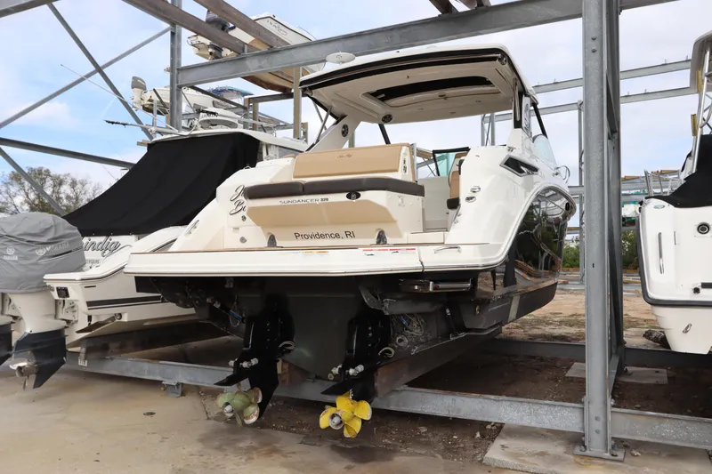 Slide: The Image of 2019 Sea Ray Sundancer 320 yacht in storage, rear view, Providence, RI. - 4