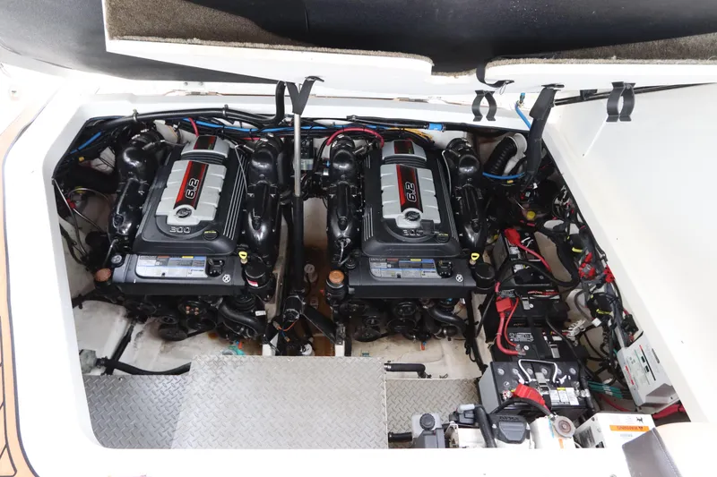 Slide: The Image of 2019 Sea Ray Sundancer 320 engine compartment with twin engines. - 44
