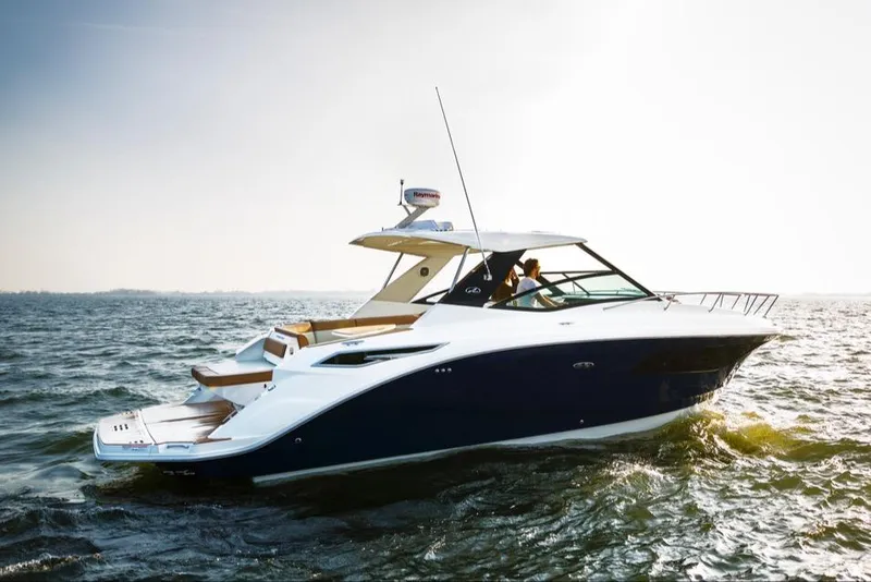 Slide: The Image of 2019 Sea Ray Sundancer 320 cruising on open water. - 45