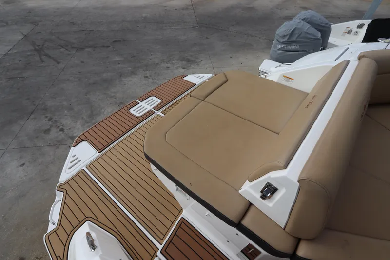 Slide: The Image of 2019 Sea Ray Sundancer 320 boat with tan seating and teak-style deck. - 6