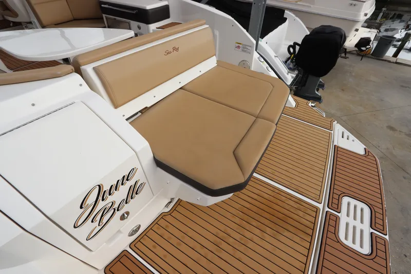 Slide: The Image of 2019 Sea Ray Sundancer 320 swim platform with tan seating and teak-style flooring. - 7