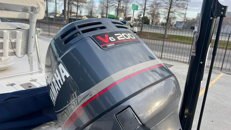 Slide: The Image of 2005 NauticStar 2200 with Yamaha V6 200 outboard motor. - 9