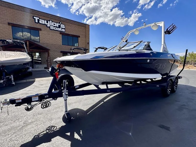 Slide: The Image of 2024 Axis A20 boat on trailer at Taylor's Boats dealership. - 2