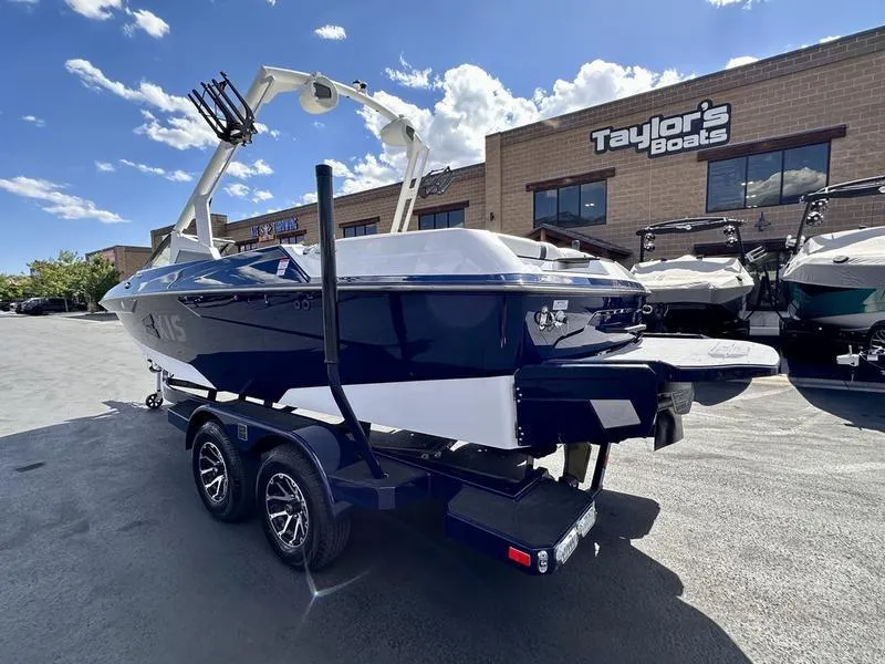 Slide: The Image of 2024 Axis A20 boat on trailer at Taylor's Boats dealership. - 9
