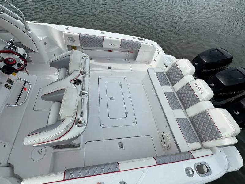 Slide: The Image of 2008 Donzi 38 ZSF boat interior with seating and outboard motors. - 10