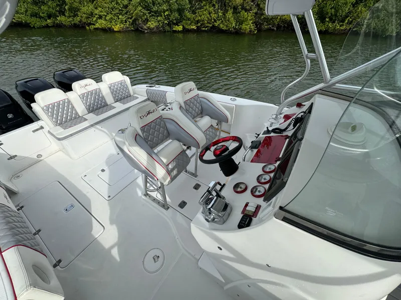 Slide: The Image of 2008 Donzi 38 ZSF boat interior with helm and seating. - 13