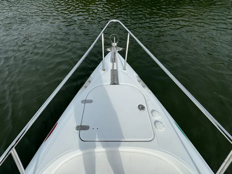 Slide: The Image of 2008 Donzi 38 ZSF boat bow on water. - 20