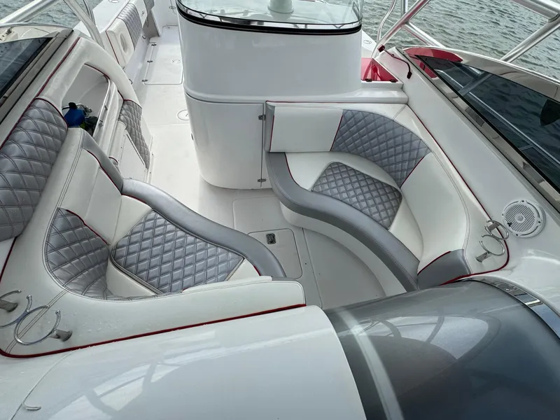 Slide: The Image of 2008 Donzi 38 ZSF boat interior with gray and white seating. - 22