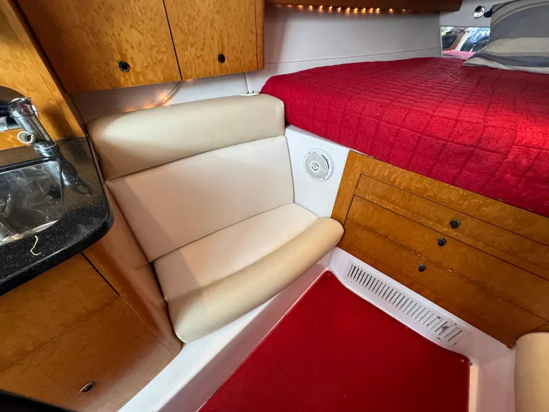 Slide: The Image of Interior of 2008 Donzi 38 ZSF boat with seating, bed, and storage. - 28