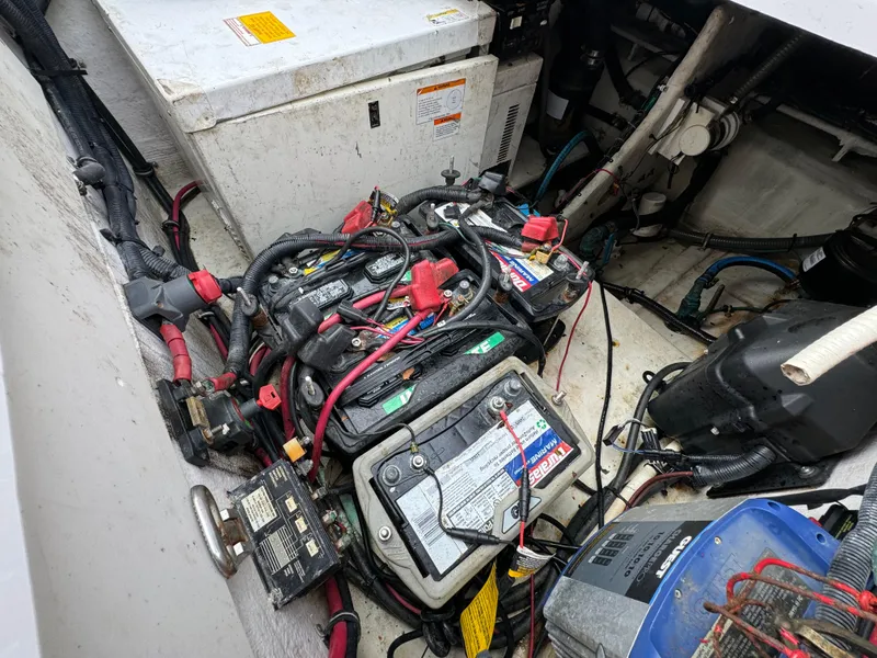 Slide: The Image of 2008 Donzi 38 ZSF engine compartment with batteries and wiring. - 35
