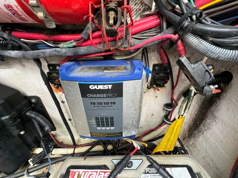 Slide: The Image of Battery charger and wiring in a 2008 Donzi 38 ZSF boat. - 36