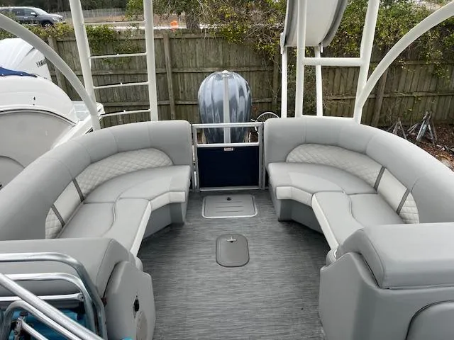 Slide: The Image of 2023 Bennington Top Deck boat with spacious seating and modern design. - 7
