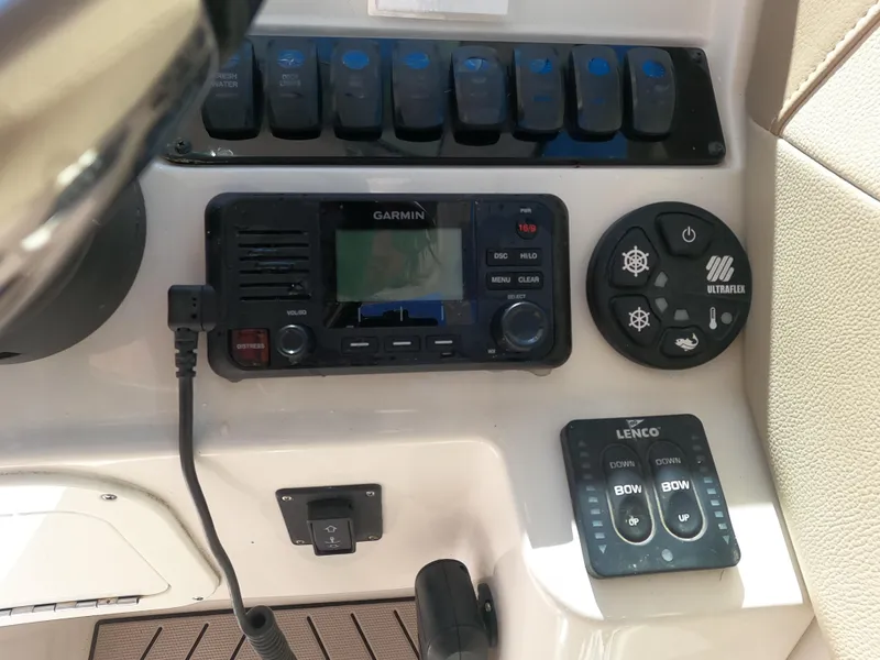Slide: The Image of Control panel of a 2017 Sailfish 245 DC boat with Garmin electronics. - 8