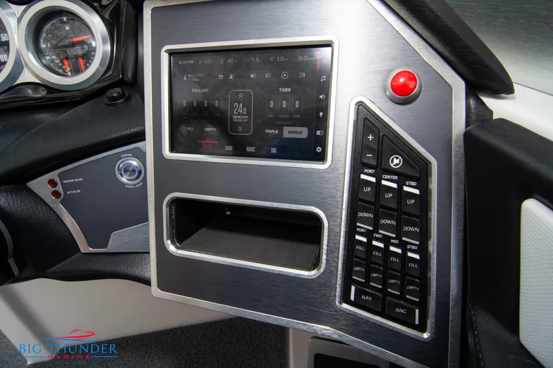 Slide: The Image of 2024 MasterCraft X22 boat dashboard with touchscreen controls and modern instrumentation. - 30