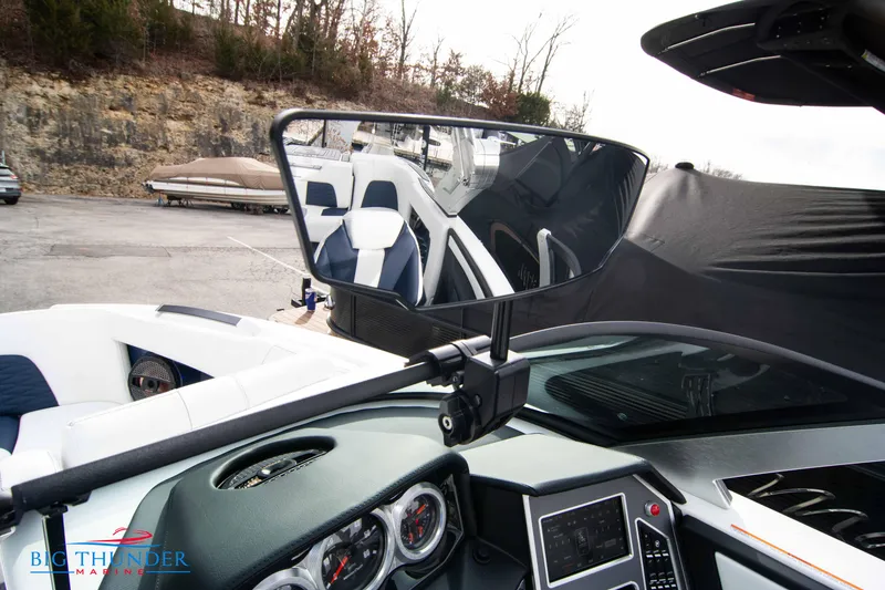 Slide: The Image of 2024 MasterCraft X22 boat dashboard and rearview mirror. - 33