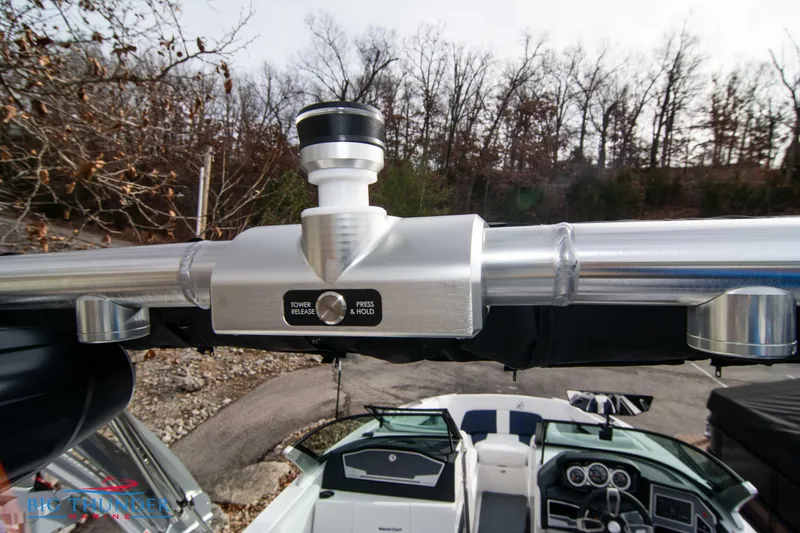 Slide: The Image of 2024 MasterCraft X22 boat with advanced wakeboard tower and control system. - 44