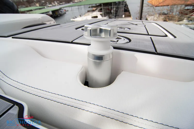 Slide: The Image of 2024 MasterCraft X22 boat deck detail with cleat and upholstery. - 46