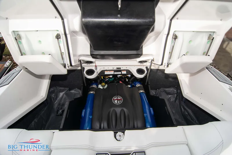 Slide: The Image of 2024 MasterCraft X22 boat engine compartment with Big Thunder Marine logo. - 47