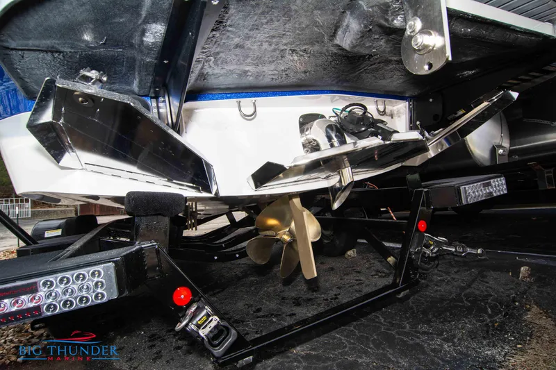 Slide: The Image of 2024 MasterCraft X22 boat propeller and trailer close-up. - 5