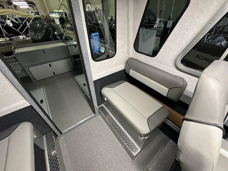 Slide: The Image of Interior of 2024 KingFisher 2325 Coastal Express boat with seating and storage. - 21