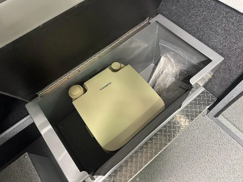 Slide: The Image of Built-in storage compartment in 2024 KingFisher 2325 Coastal Express boat. - 22
