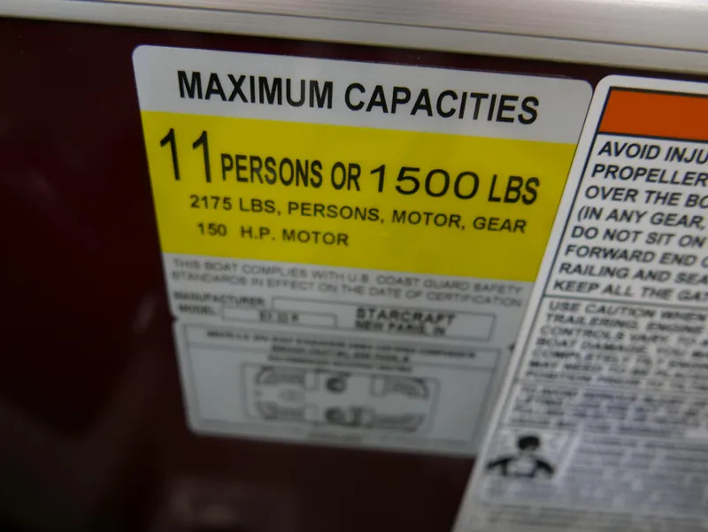 Slide: The Image of 2024 Starcraft EX 22 R capacity label: 11 persons or 1500 lbs, 150 HP motor. - 15