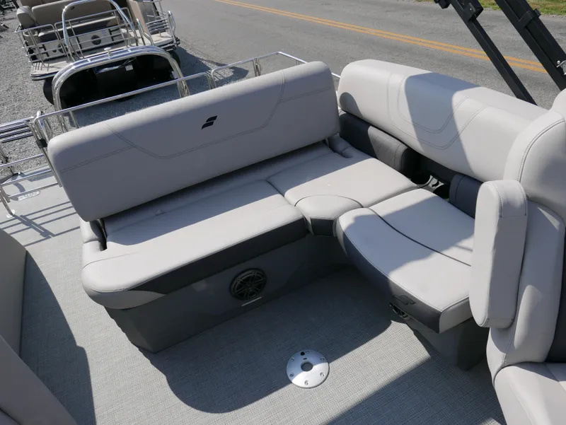 Slide: The Image of 2024 Starcraft SLS 3 Q DH pontoon boat with comfortable seating and modern design. - 16