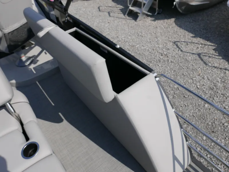 Slide: The Image of 2024 Starcraft SLS 3 Q DH boat seat with storage compartment open. - 24